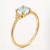 Sortija Amélie Pavé de Diamantes y Topacio Azul en Oro Amarillo de 18 kt