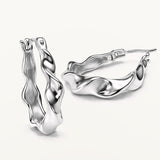 Pendientes Aro Oval Ondulado en Plata de Primera Ley